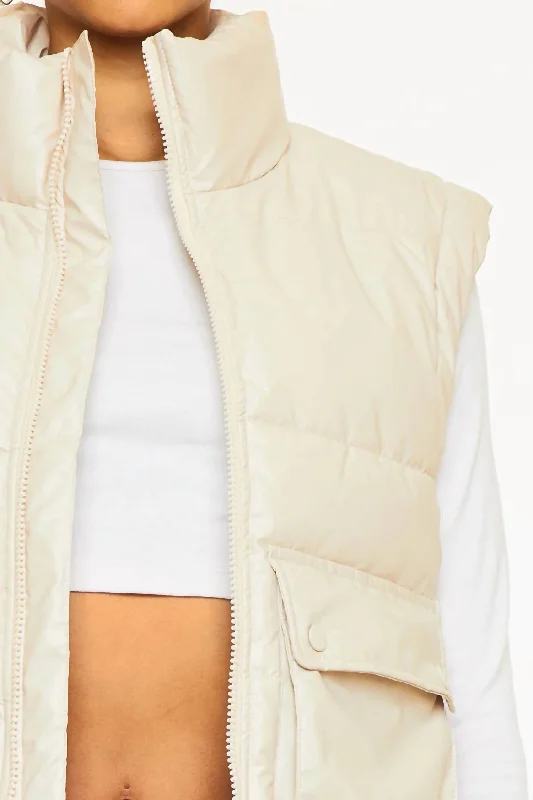 women's coats for those who seek both warmth and flairFrida Cropped Faux Leather Puffer Vest In Cream